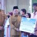 Wakili Bupati Ratu Zakiyah, Najib Hamas Serahkan Bantuan 497 RTLH